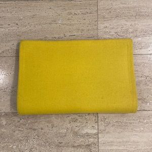 Yellow clutch bag